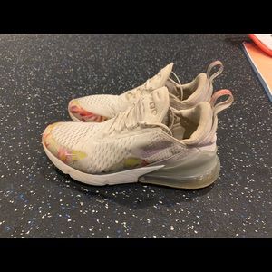 Hard to find Nike AirMax 270 white with pop of floral coloring sneaker.